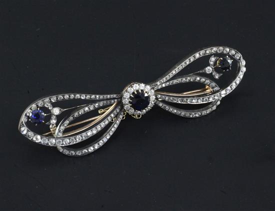 A 19th century gold and silver, diamond and sapphire trembleuse bow brooch, 3.5in.
